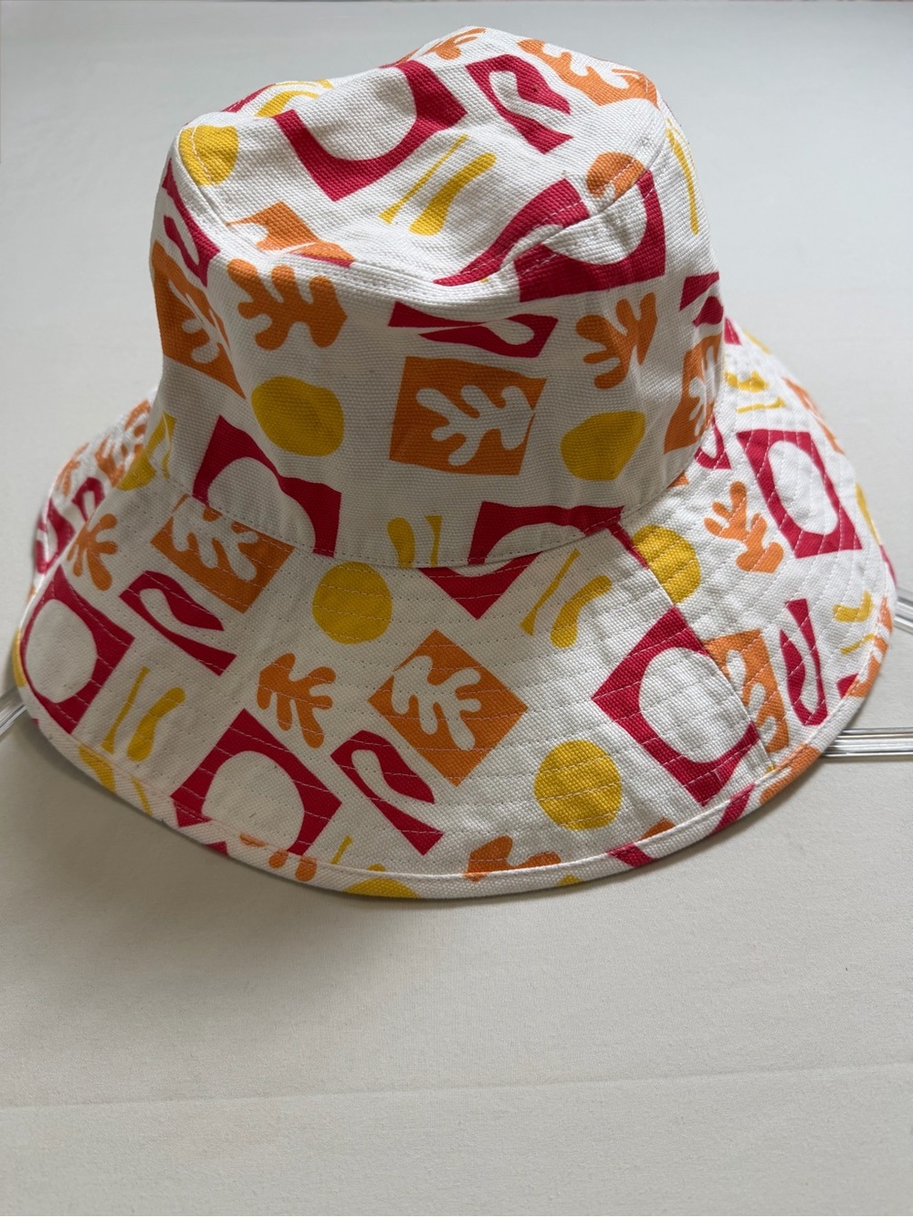 Lack Of Color White Bucket Hat with Pink, Orange & Yellow Abstract Print - Picture 1 of 5